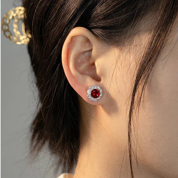 Round Ruby Halo Stud Earrings — earrings worn on ear
