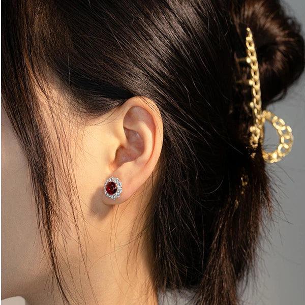 Round Ruby Halo Stud Earrings — paired earrings view