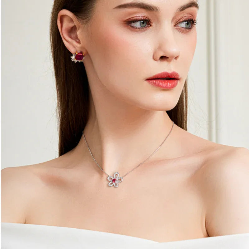 Ruby Floral Pendant Necklace with Cubic Zirconia Accents — necklace worn at neckline