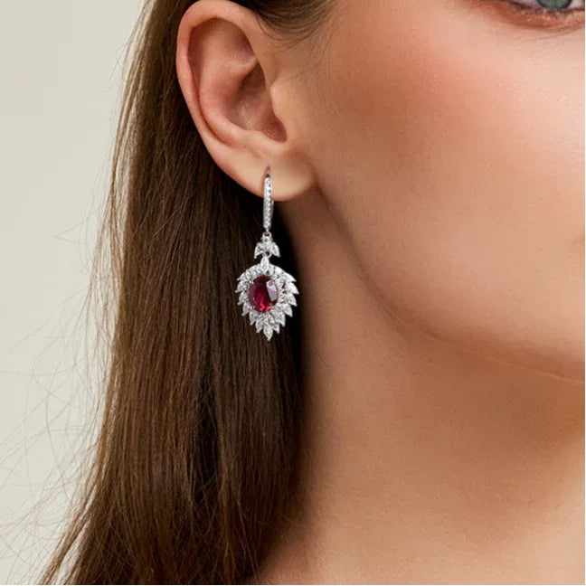 Ruby Oval Earrings — earrings worn on ear