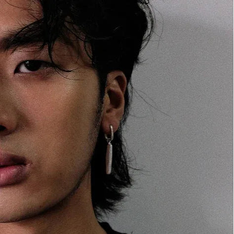 Long Baroque Pearl Drop Earrings — portrait worn view showing the drop below the jawline