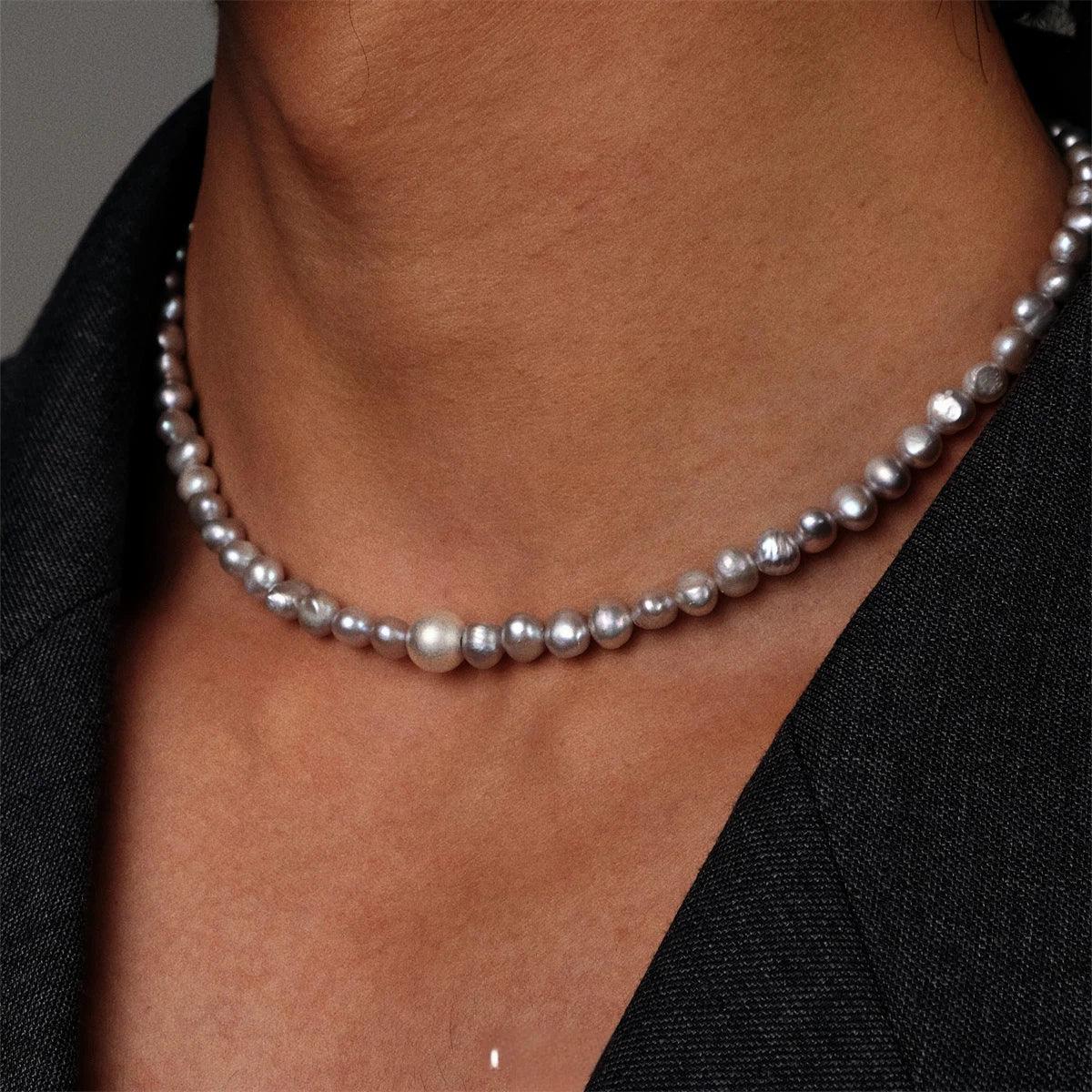 Gray Pearl Strand Necklace with Adjustable S925 Silver Clasp — front neckline-worn close-up over a black V-neck top