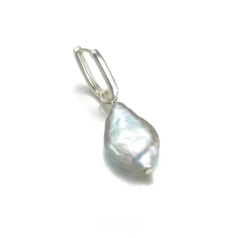 Irregular Pearl Drop Huggie Earrings — angled view of the textured pearl surface