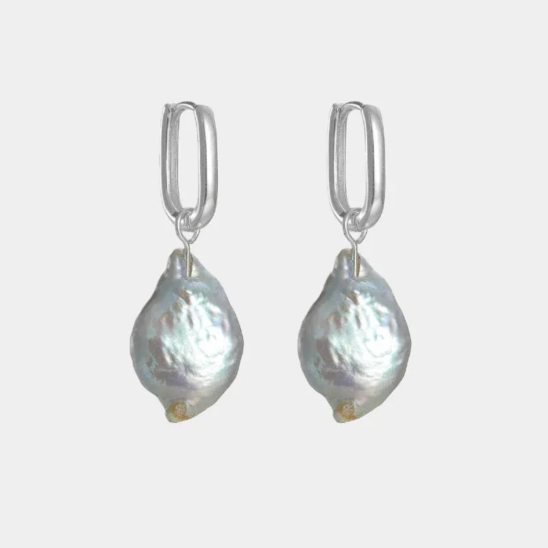 Irregular Pearl Drop Huggie Earrings — front pair of rectangular huggie hoops with irregular teardrop pearls