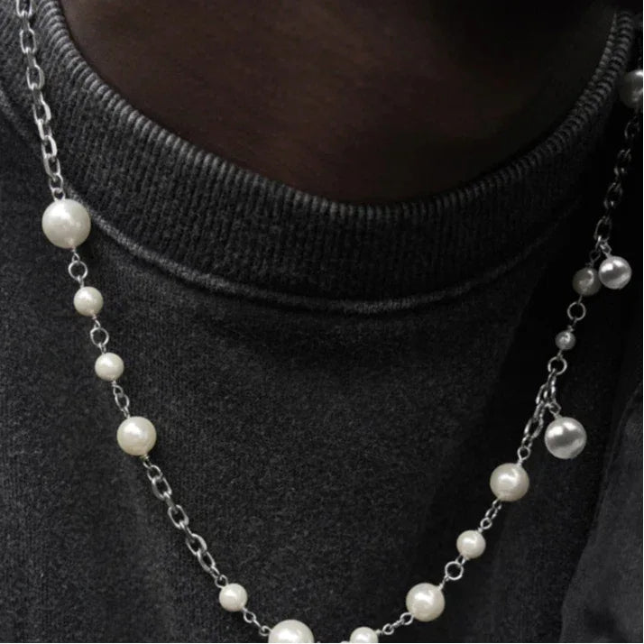 Adjustable Pearl Station Chain Necklace — neckline close-up over a dark ribbed top