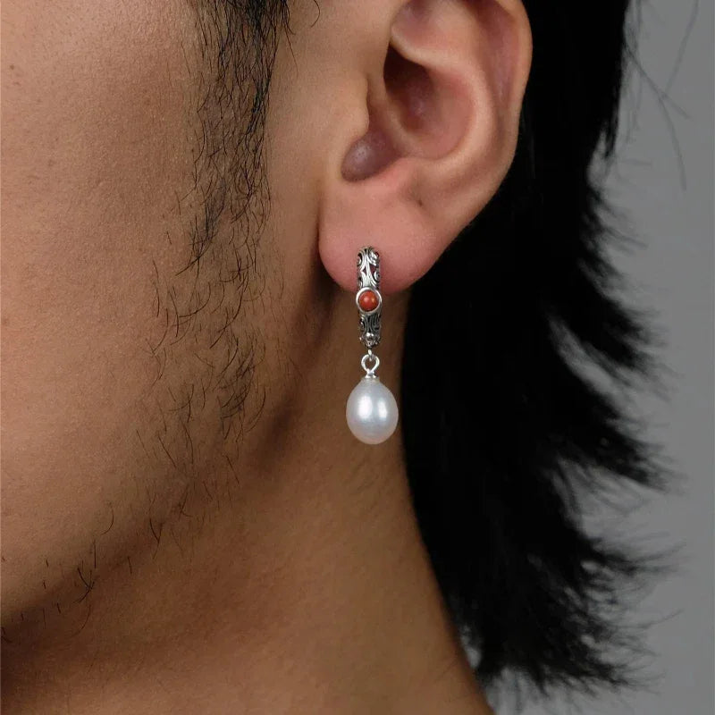S925 Silver Pearl Drop Huggie Earrings with Red Accent — alternate left-ear worn side view