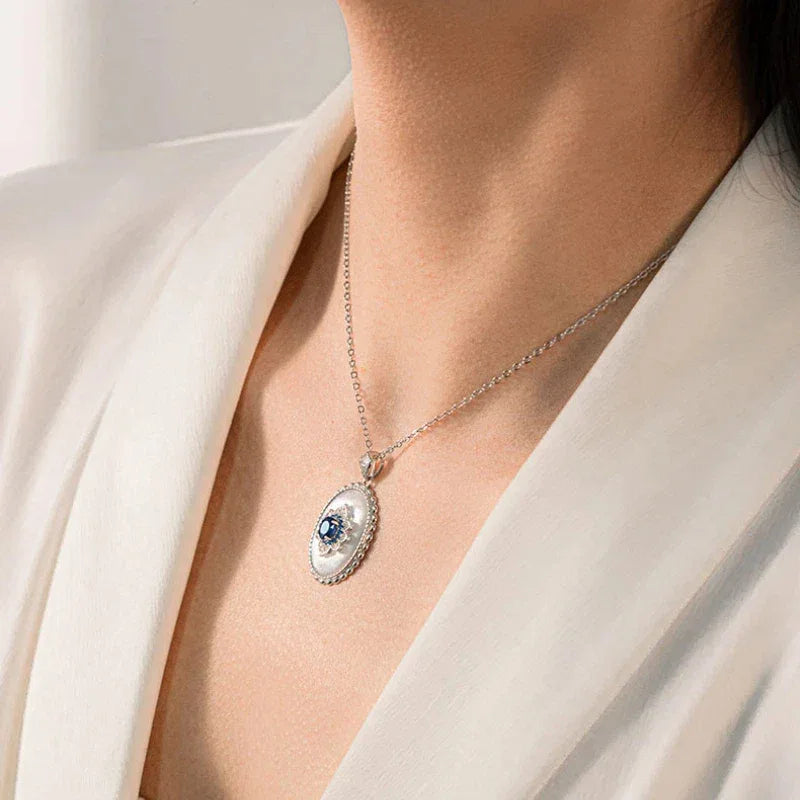Sapphire and Mother-of-Pearl Oval Pendant Necklace — second neckline-worn view from a slightly different angle