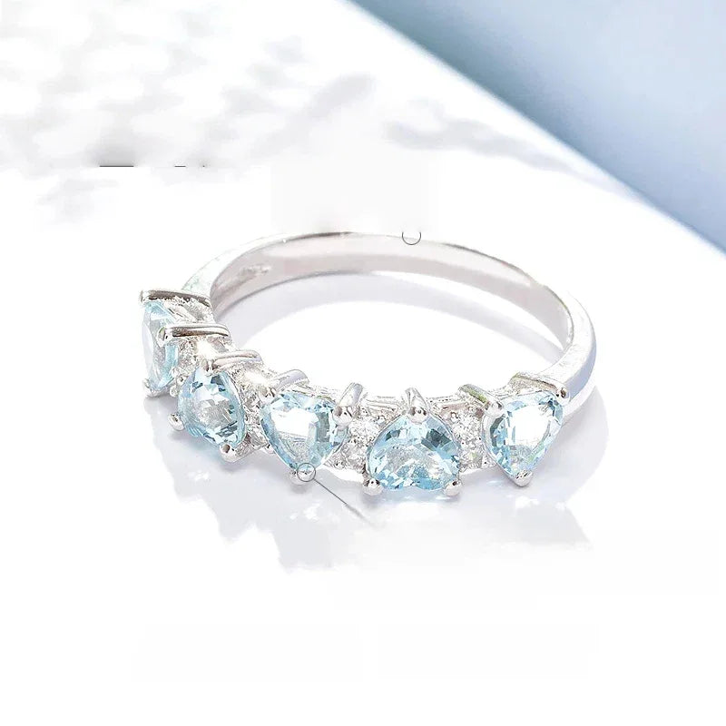 Seven-Stone Aquamarine Band Ring side profile showing the band and setting