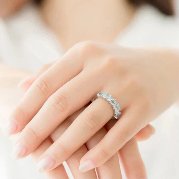 Seven-Stone Aquamarine Band Ring worn on the hand from a second angle