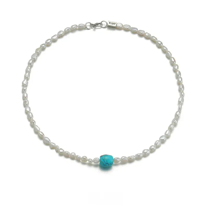 Pearl Strand Necklace with Turquoise Center Bead in S925 Silver - complete necklace on a white background