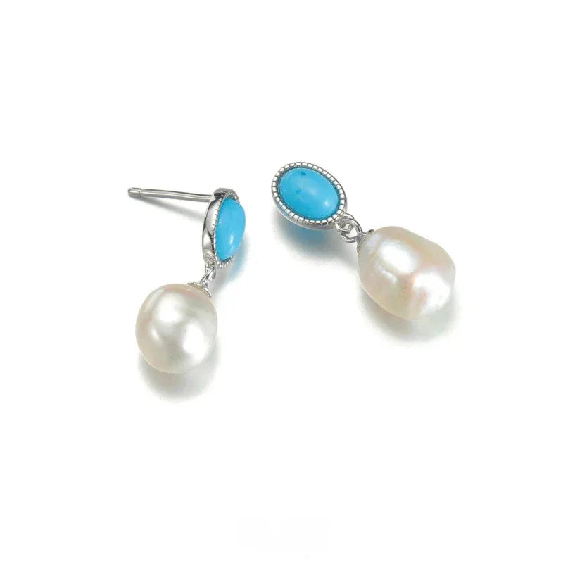 Pearl Drop Earrings with Turquoise-Blue Oval Accents in S925 Silver - angled pair showing posts and pearl shape