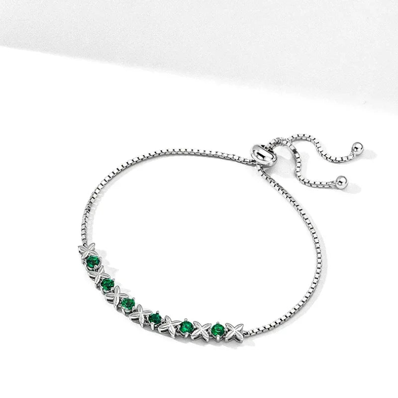 Six-Flower Emerald Adjustable Bracelet clasp and link detail on white