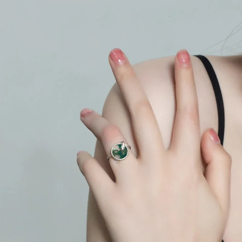 Snake Coiled Moss Agate Ring — hand-worn scale view 2