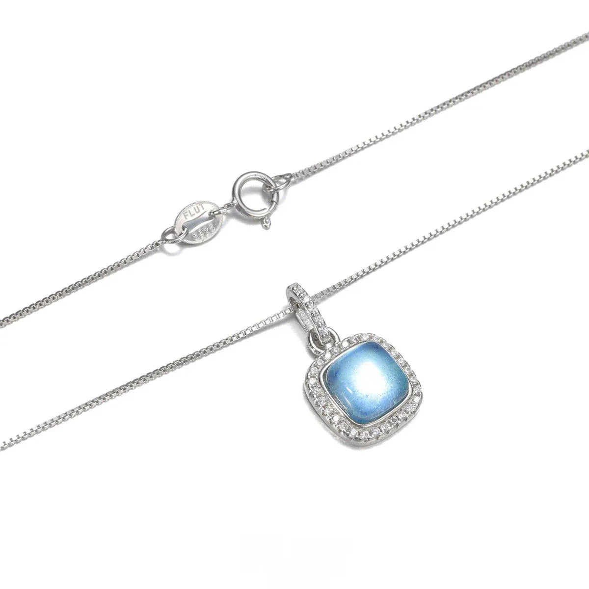 Square Aquamarine Halo Pendant Necklace styled neckline view showing pendant scale