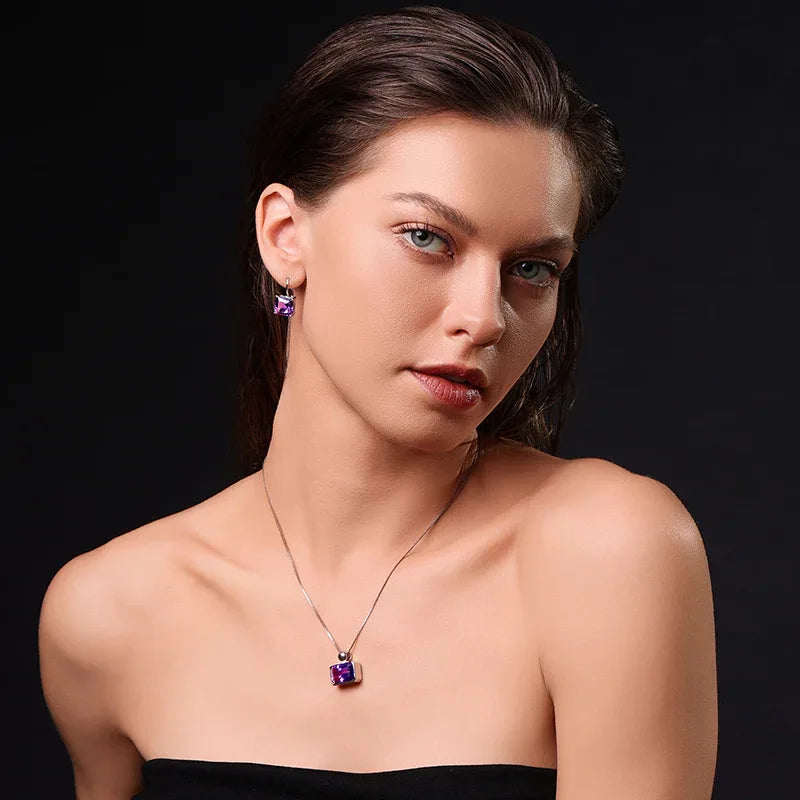 square-cut amethyst hook earrings worn on the ear from a second angle