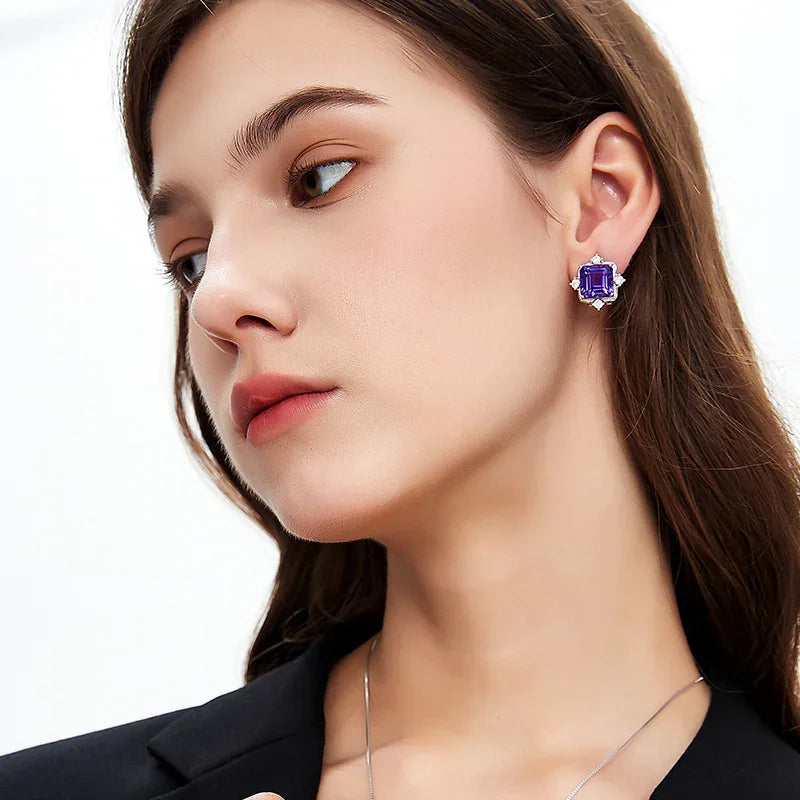 square-cut amethyst stud earrings styled portrait showing the earrings for scale