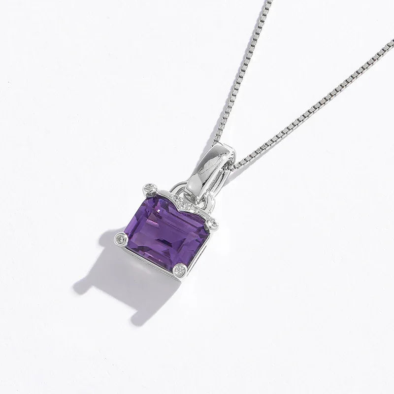 square-cut amethyst pendant necklace worn at the neckline in a portrait