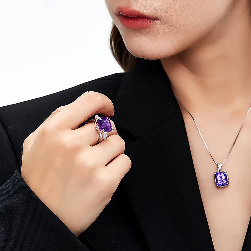 square-cut amethyst ring worn on the hand from a second angle