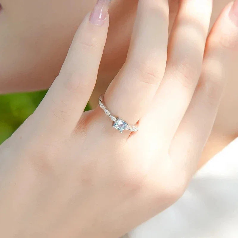 Square-Cut Aquamarine Accent Ring styled hand view showing ring scale