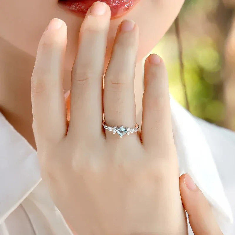 Square-Cut Aquamarine Crown Ring worn on the hand from a second angle