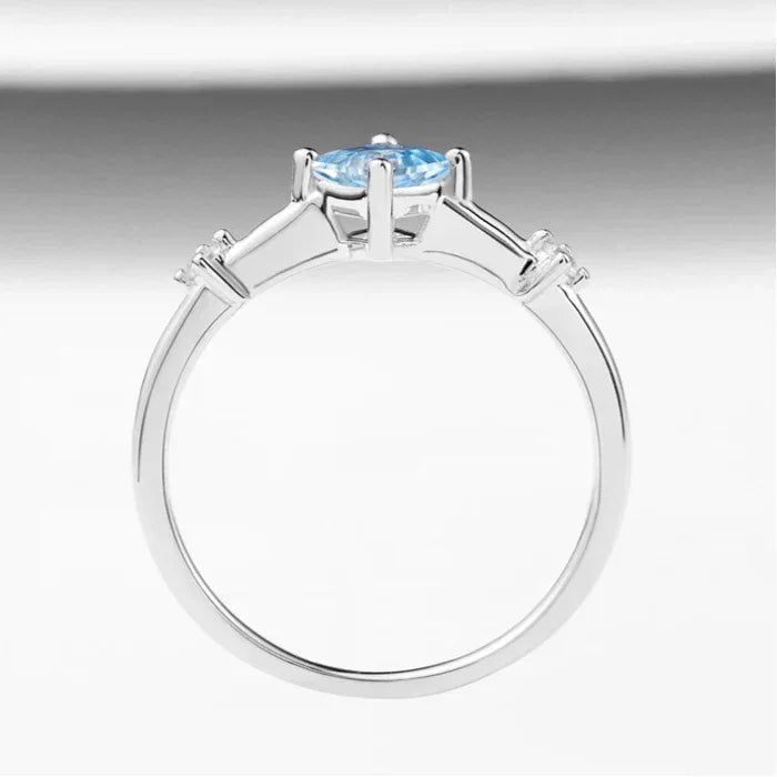 Square-Cut Aquamarine Open Ring angled product view showing the setting