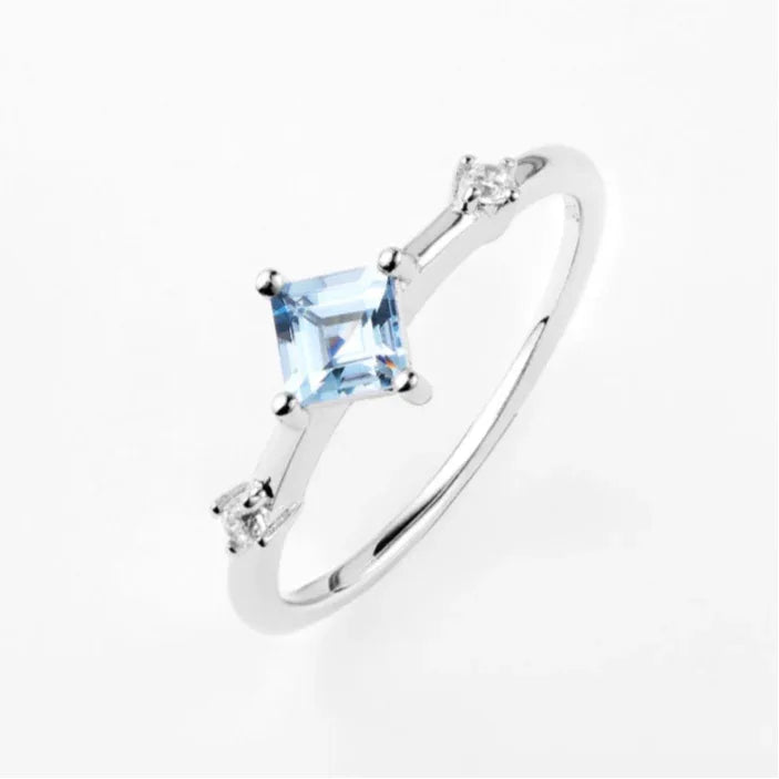 Square-Cut Aquamarine Open Ring styled hand view showing ring scale