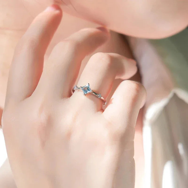 Square-Cut Aquamarine Open Ring worn on the hand from a second angle