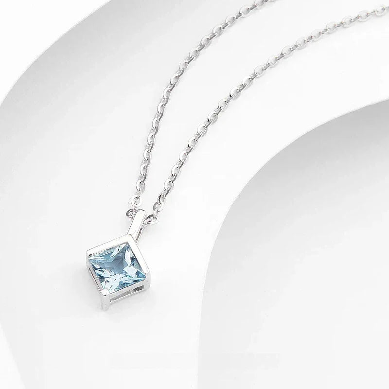 Square-Cut Aquamarine Pendant Necklace angled pendant detail on white