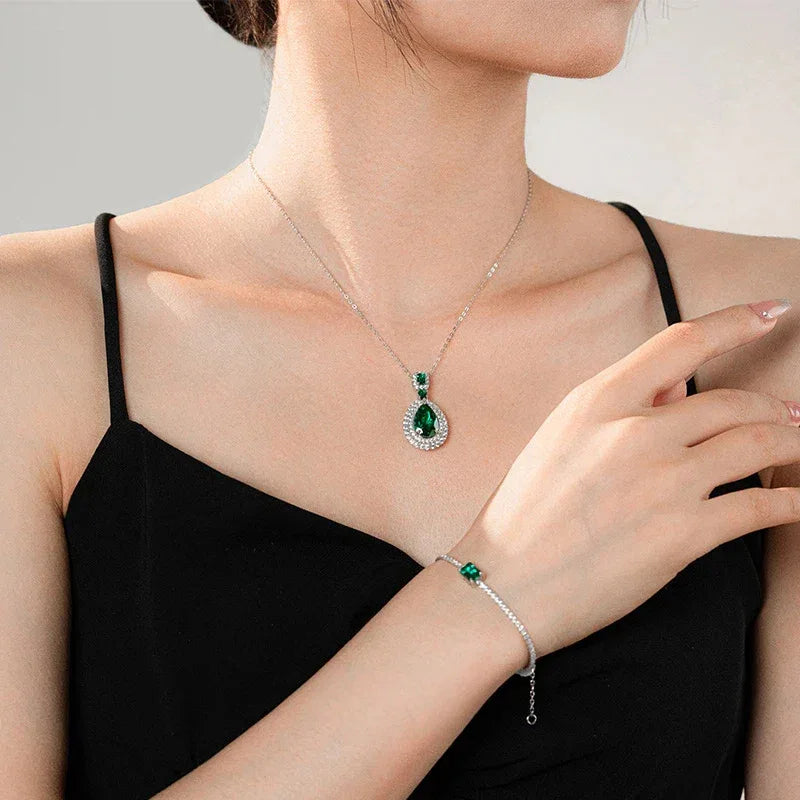 Square Emerald Tennis Bracelet worn on the wrist in a close-up