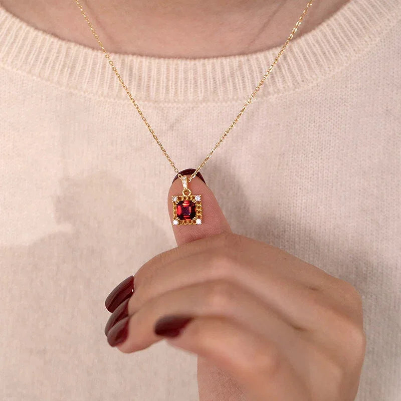 Square Garnet Ornate Pendant Necklace worn at the neckline from a second angle