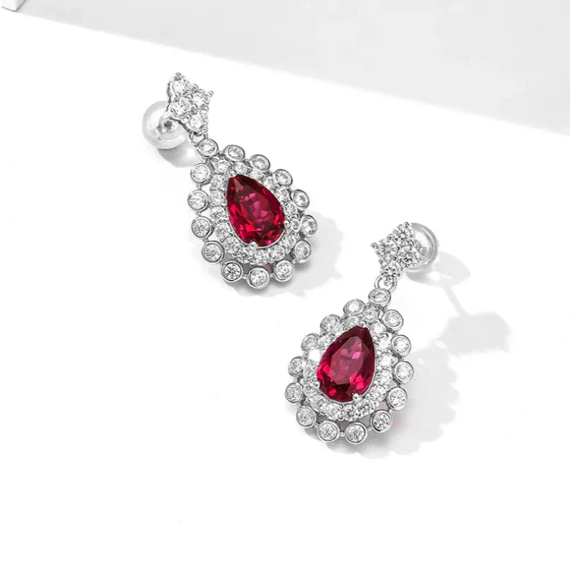 Starlight Series Ruby Teardrop Earrings — earrings worn on ear 7