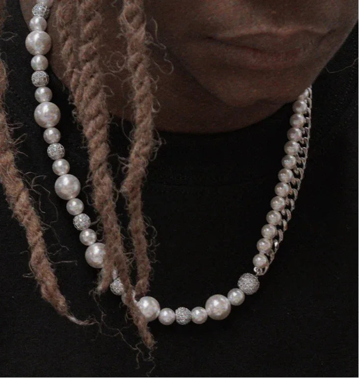 Steel Cuban Chain and Pearl Half-and-Half Necklace — model portrait wearing the necklace beside a second pearl strand