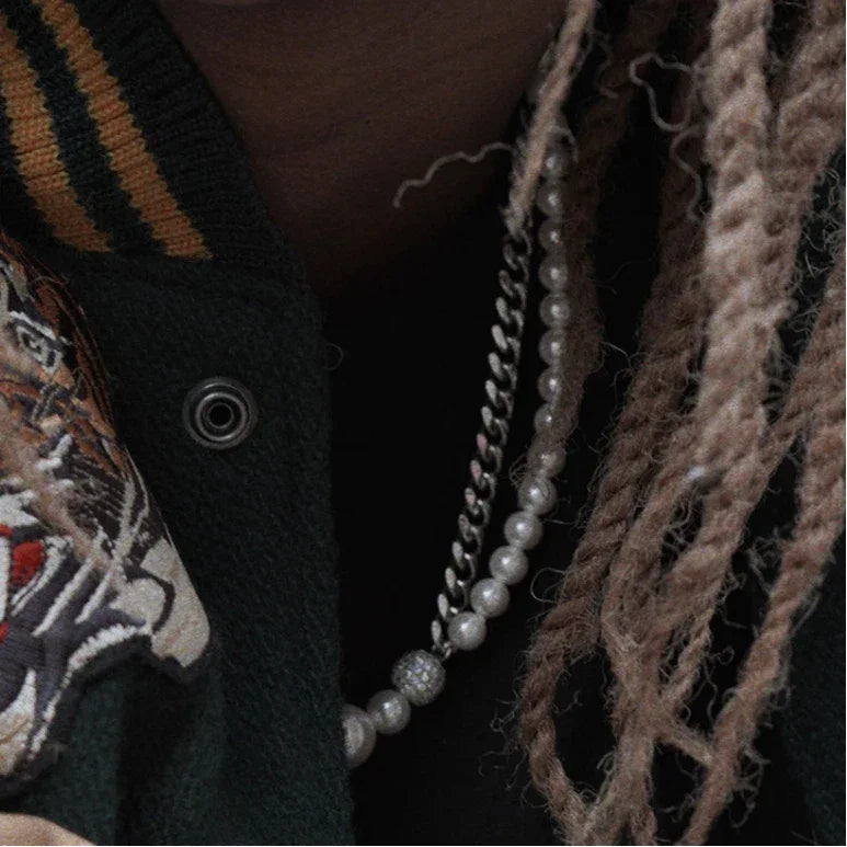 Steel Cuban Chain and Pearl Half-and-Half Necklace — close worn view emphasizing the steel Cuban chain half