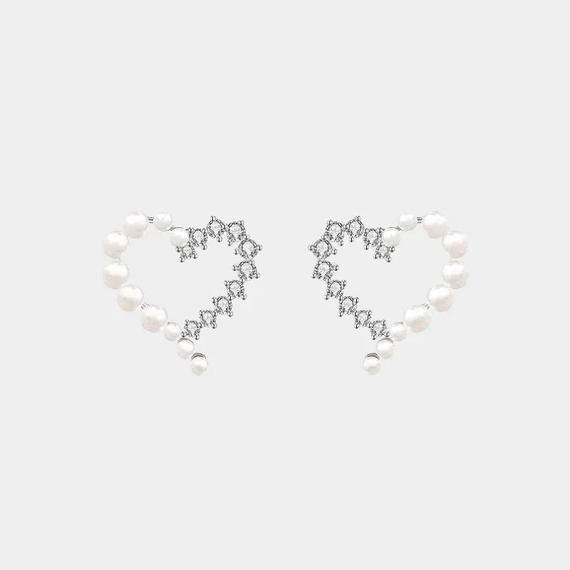Pearl and Textured Open Heart Stud Earrings — front pair of heart studs with pearl and textured silver halves