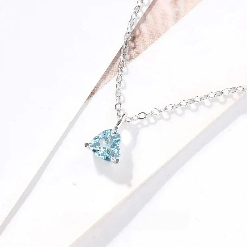 Triangle-Cut Aquamarine Pendant Necklace styled neckline view showing pendant scale