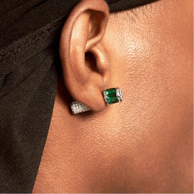 Two-Tone Emerald Cylindrical Stud Earrings styled ear view showing scale