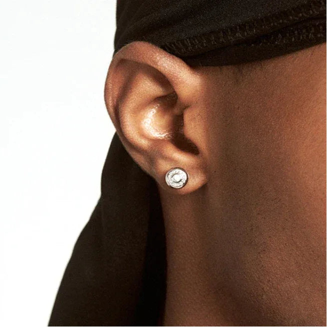 Two-Tone Emerald Cylindrical Stud Earrings worn on the ear from a second angle