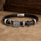 Black leather bracelet with black agate, silver-tone medallion and cross accents on beige stone