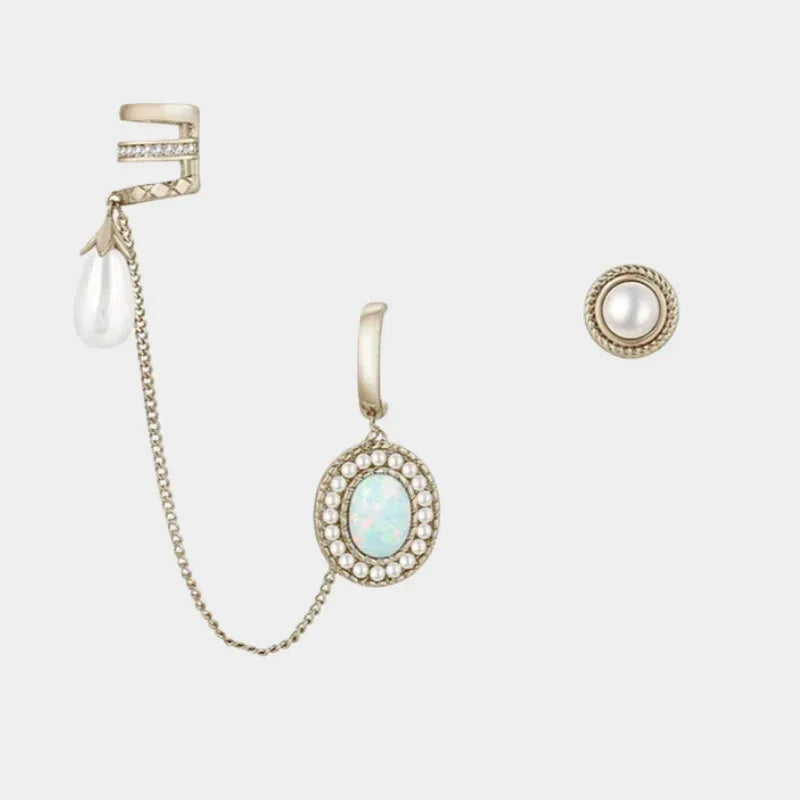 White Opal Asymmetric Chain Earrings front product view on a light background
