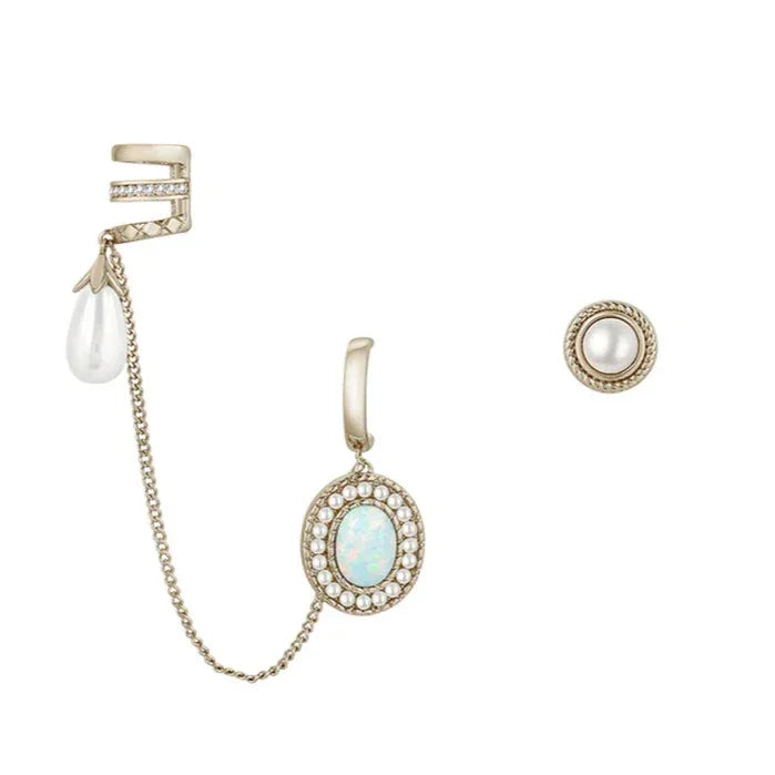 White Opal Asymmetric Chain Earrings worn on the hand from another angle