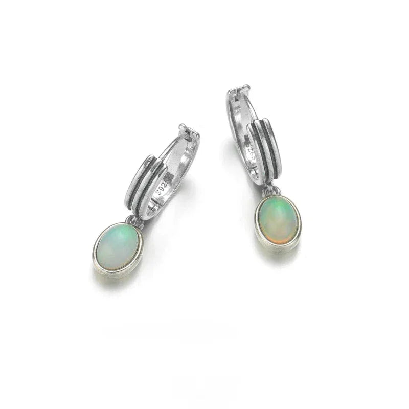 White Opal Drop Huggie Earrings top setting detail