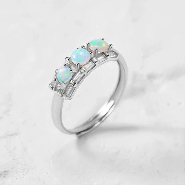 White Opal Five-Stone Adjustable Ring worn on the hand