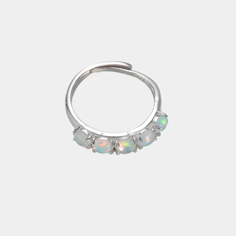 White Opal Half-Eternity Adjustable Ring front product view on a light background