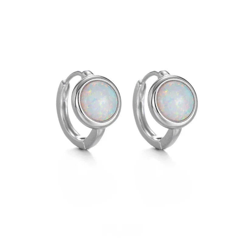 White Opal Huggie Hoop Earrings worn on the hand