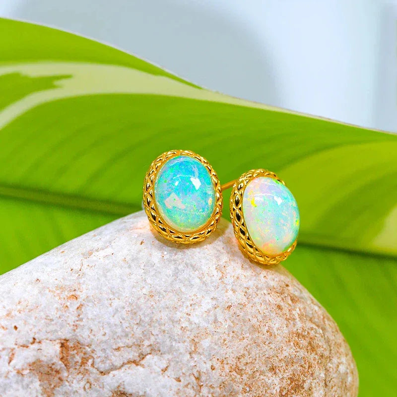 White Opal Oval Stud Earrings angled product view