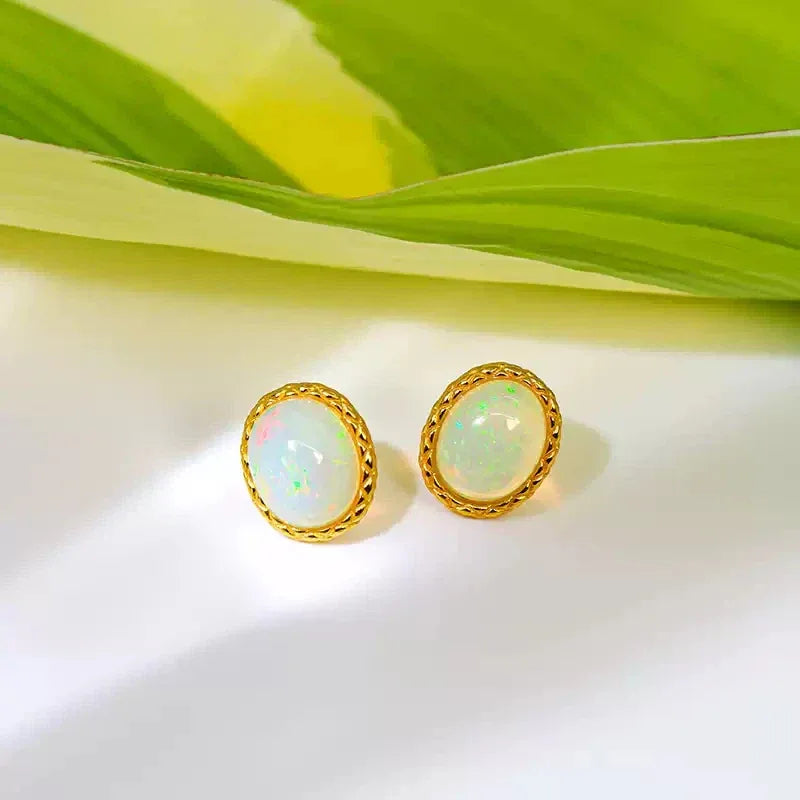 White Opal Oval Stud Earrings side profile view