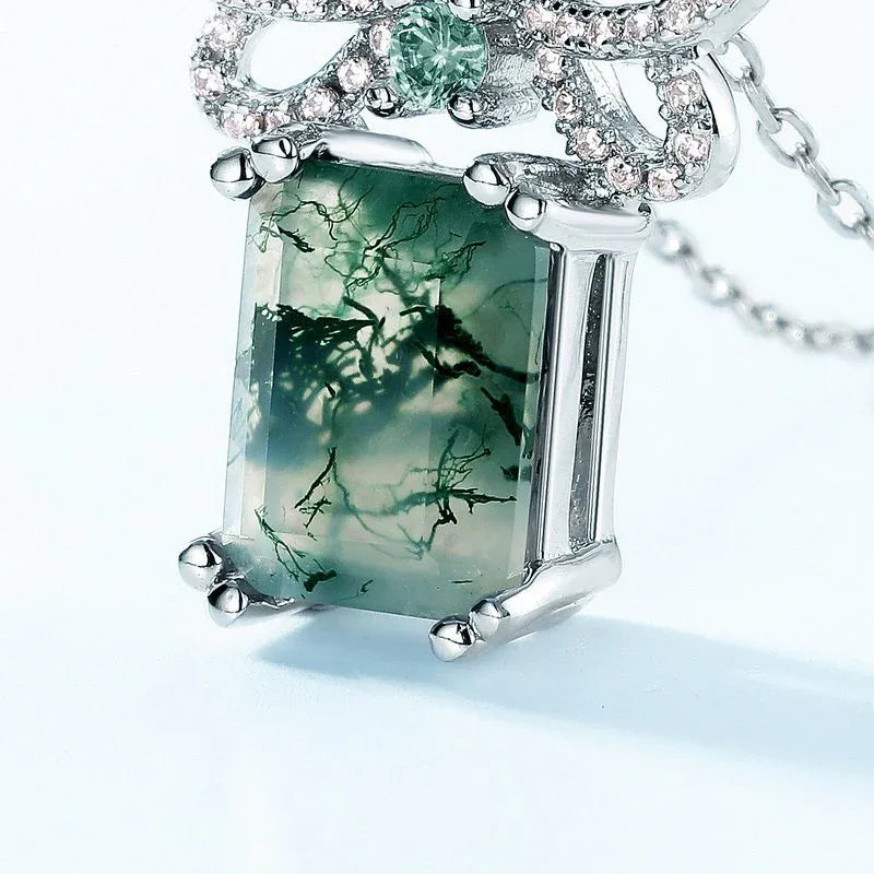 Rectangular Moss Agate Bow Pendant Necklace — rectangular pendant and pavé-style bow close-up