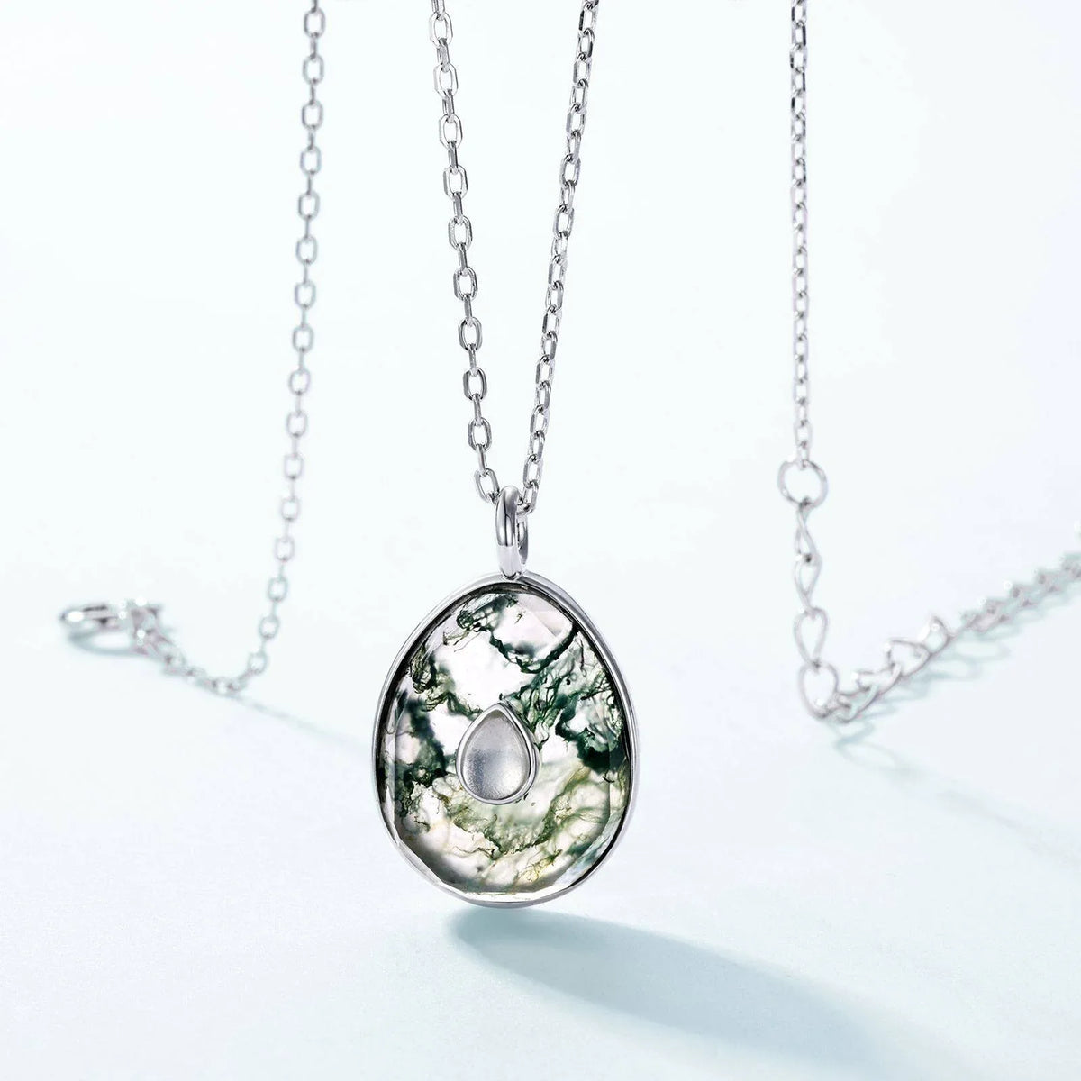 Women's Oval Moss Agate Pendant Necklace — angled pendant and chain detail 4